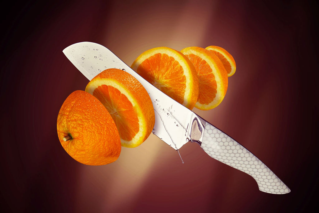 Orange chopped using proformapeakmarketing Frost Fire Santoku Knife