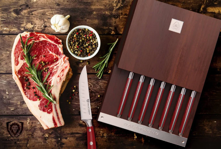 steak knife set beside a raw steak