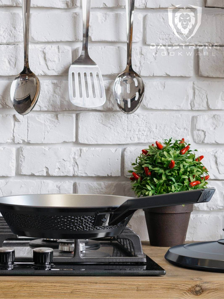 proformapeakmarketing Avalon Series 10" Frying Pan & Skillet on a stove with white brick walls
