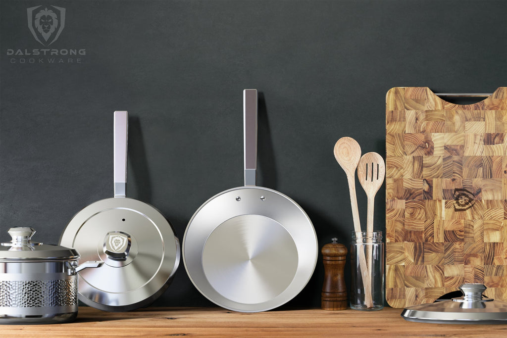 skillets laying against the wall with cutting board