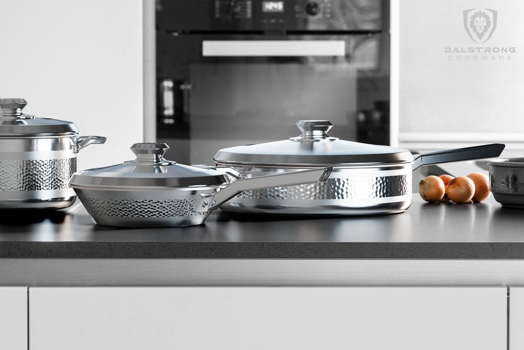 stainless steel cookware sitting on a countertop