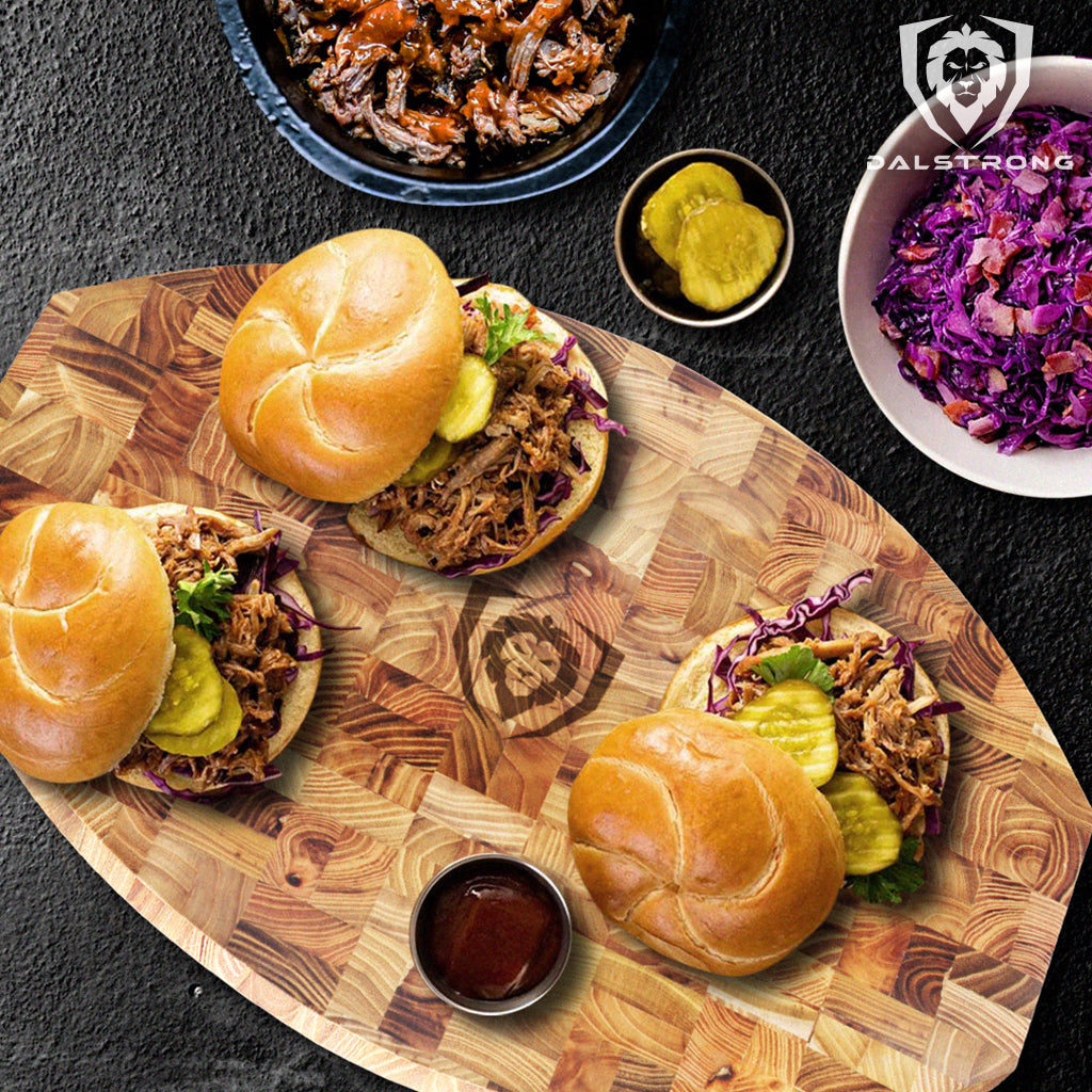 cutting board with pulled pork sandwiches