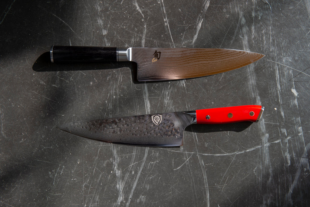 proformapeakmarketing knife next to a shun knife on a dark grey surface