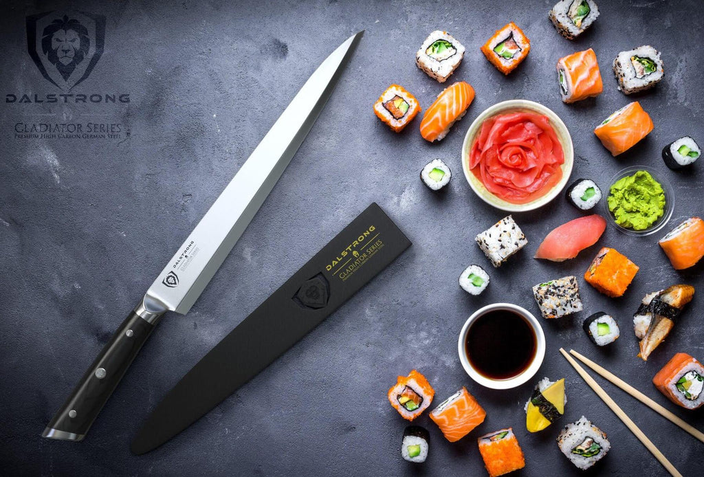 Yanagiba slicer next to a bowl of soy sauce and a wide range of sushi pieces