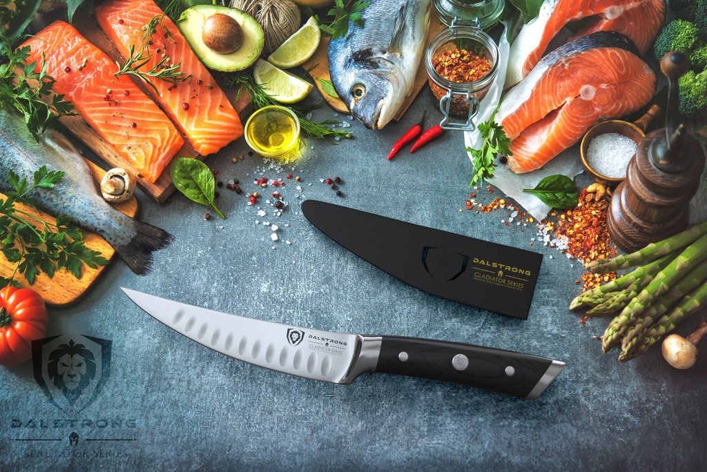 filet knife with salmon surrounding it