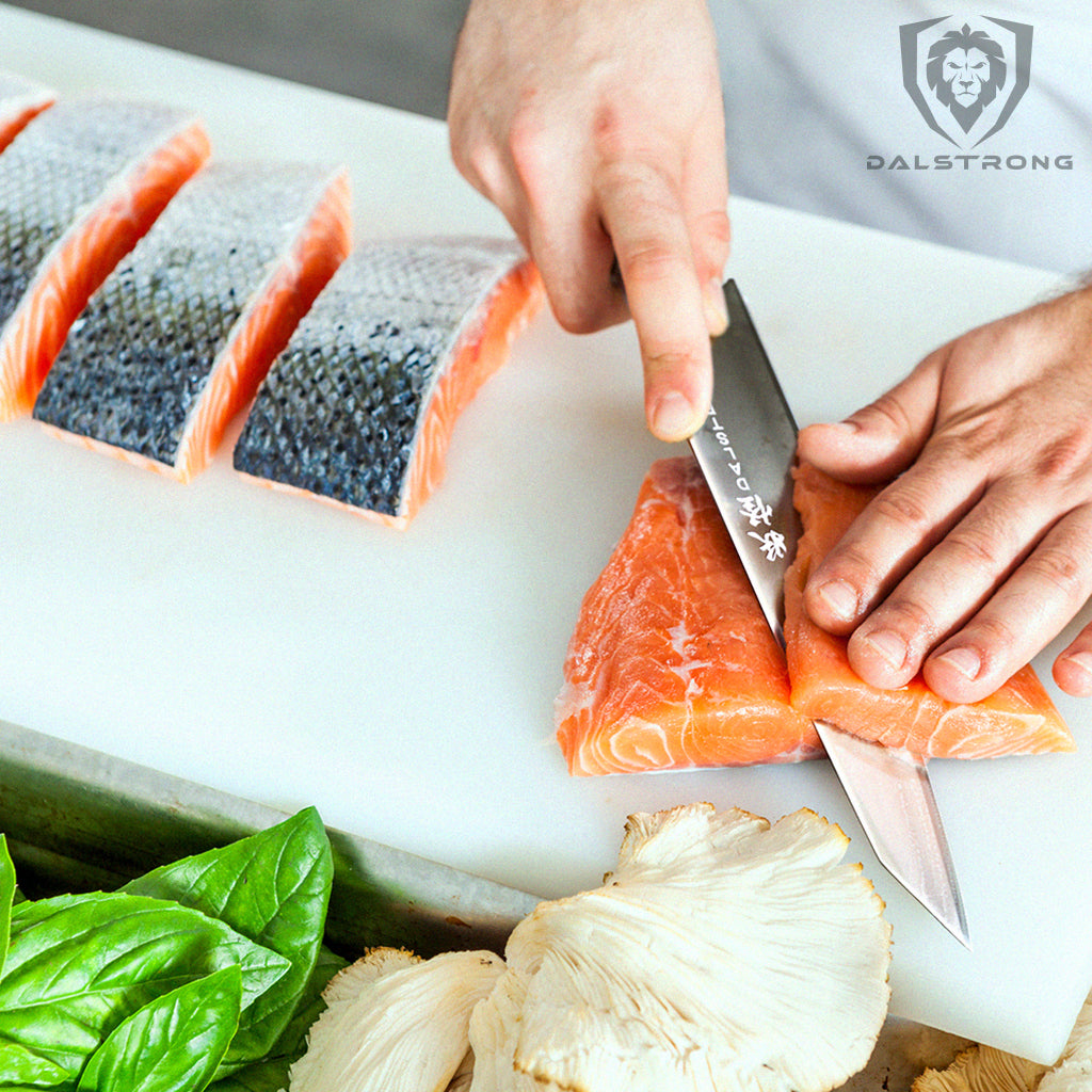 cutting salmon on cutting board