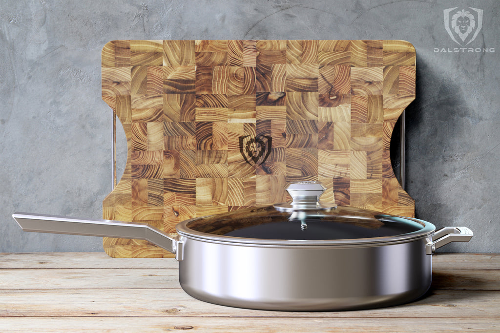 Stainless Steel Frying Pan resting on a countertop with a large wooden cutting board in the background