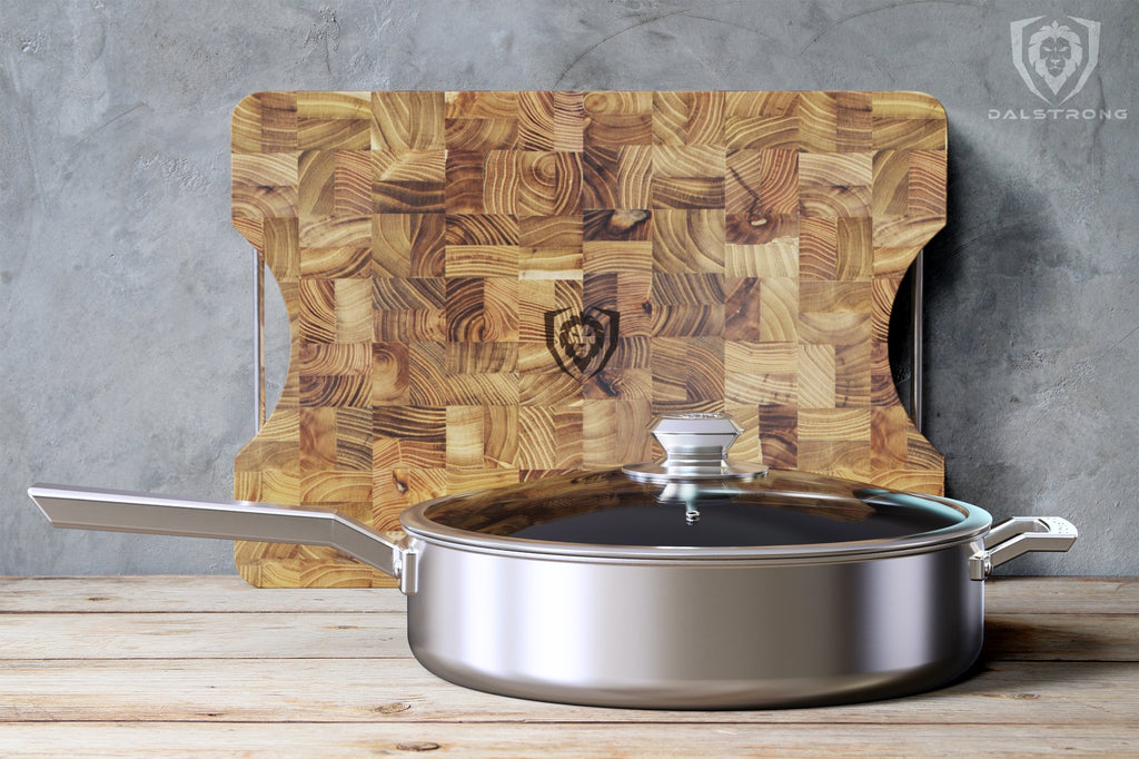 Stainless Steel 12" ETERNA Non-Stick Sauté Frypan on a wooden table with a cutting board in the background