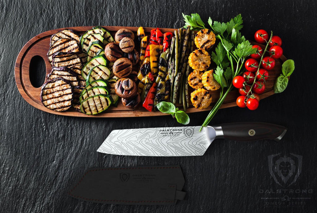 santoku knife beside cut vegetables