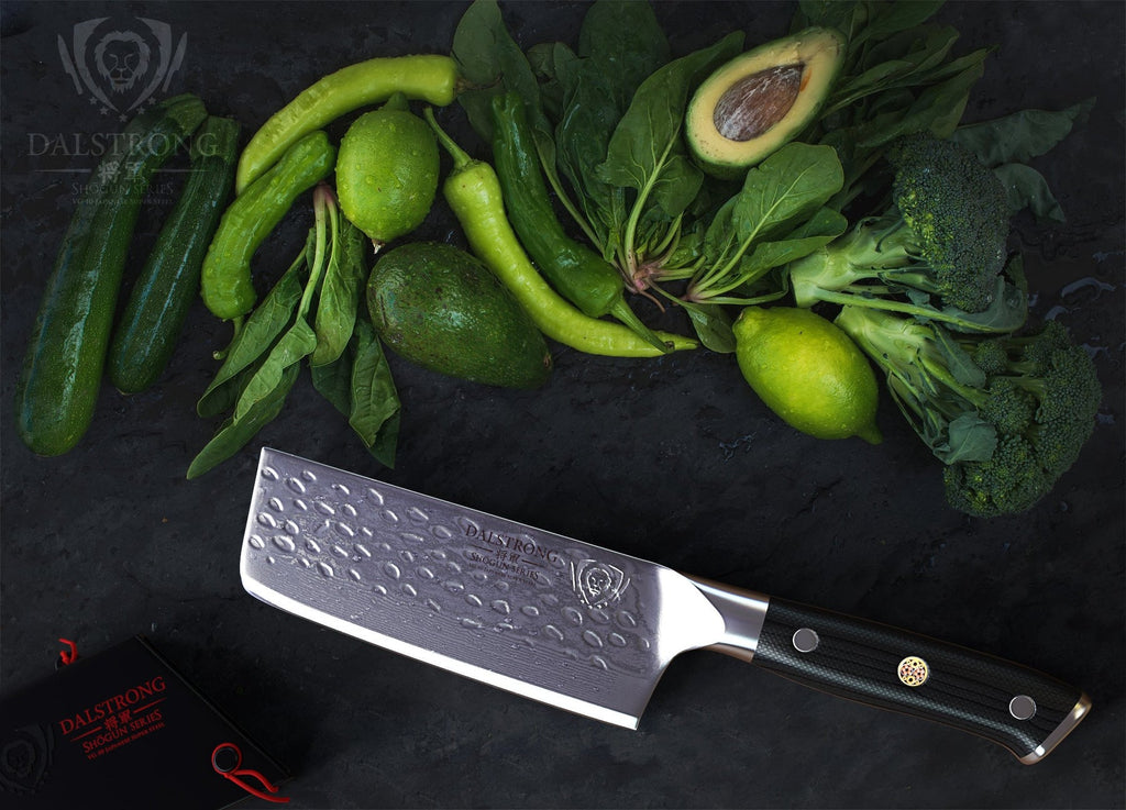 nakiri knife beside green veggies