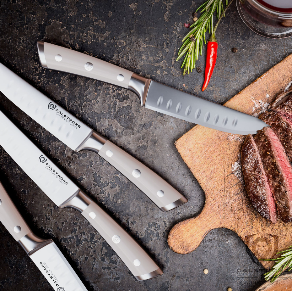 proformapeakmarketing Gladiator 4-Piece Straight-Edge Steak Knife Set with a freshly cooked steak on a wooden cutting board on the side