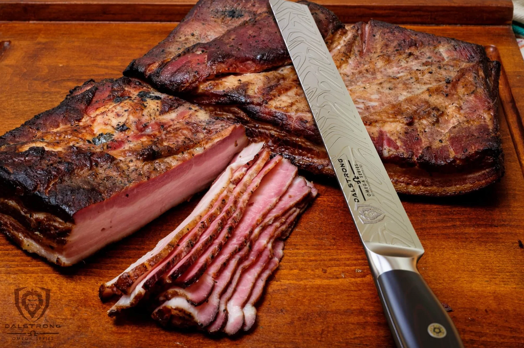 Slices of bacon with the proformapeakmarketing Slicing & Carving Knife 12" Omega Series on top of a wooden board
