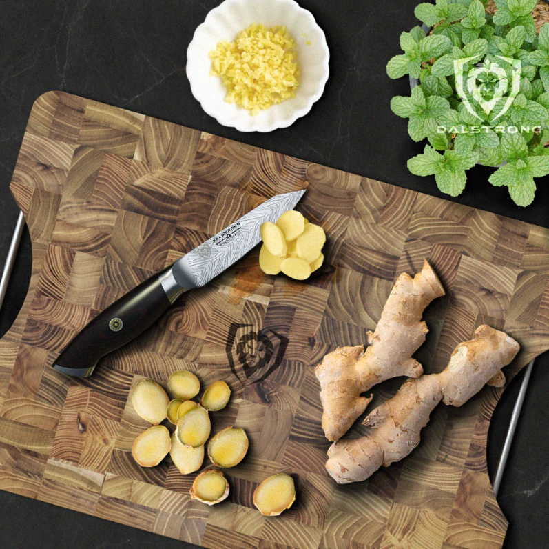 A photo of ginger root on cutting board with proformapeakmarketing paring knife