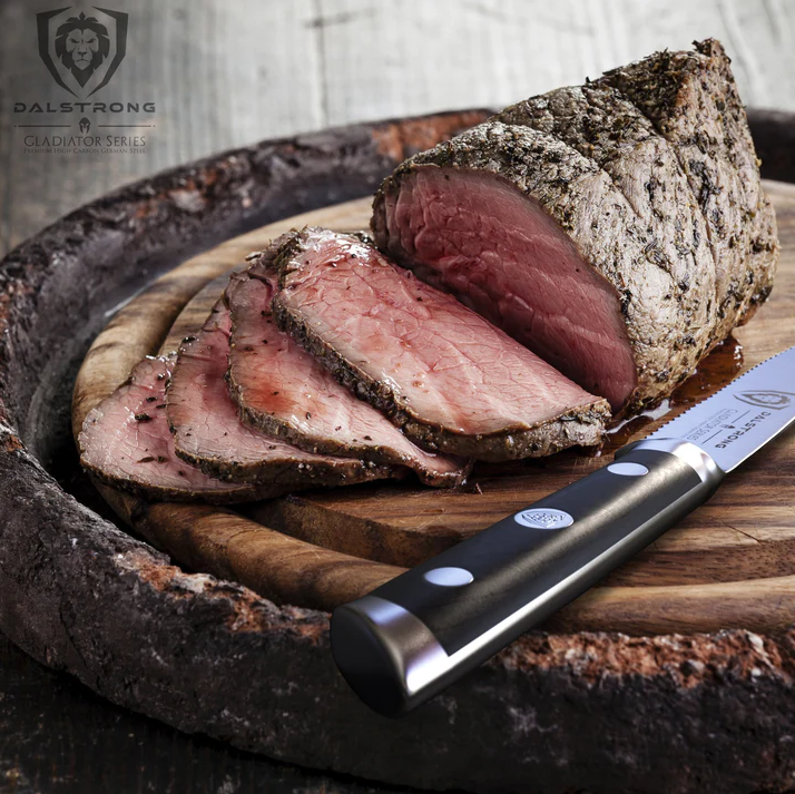 A photo of the proformapeakmarketing 4-Piece Serrated Steak Knife Set Gladiator Series NSF Certified beside a sliced cook meat on top of a wooden board