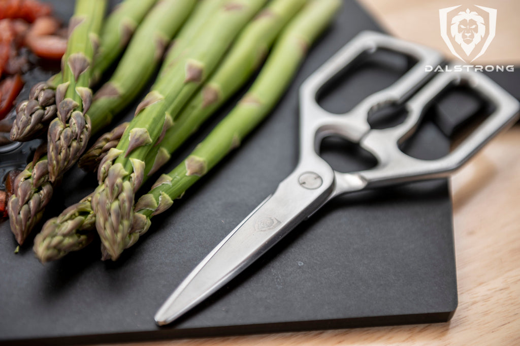 proformapeakmarketing Kitchen Shears on a black cutting board with asparagus on the side