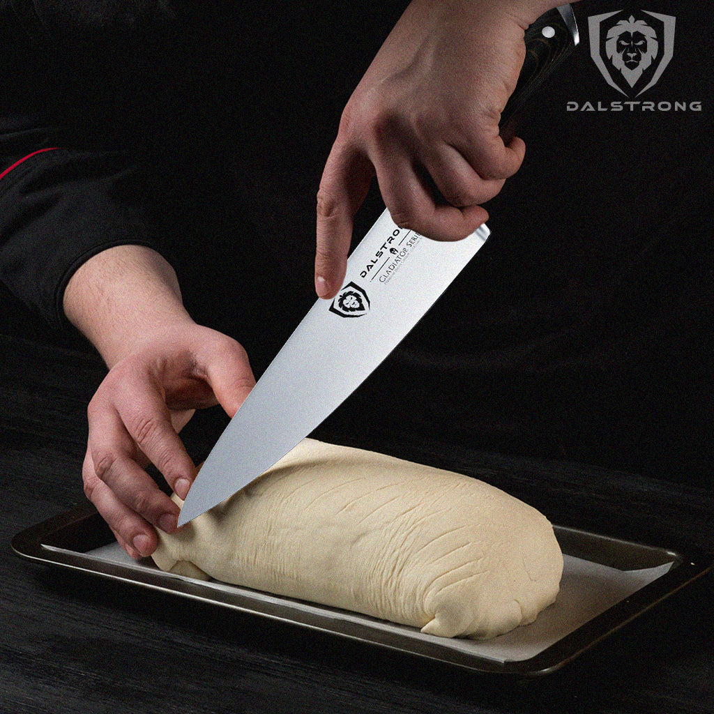 chef scoring a beef wellington with chef knife