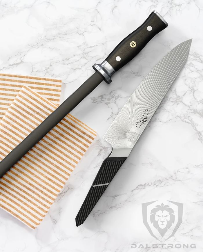 proformapeakmarketing Ceramic honing rod next to Quantum Series chef knife on a marble countertop