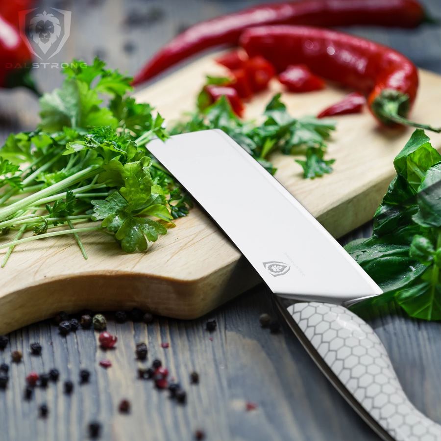 proformapeakmarketing Frost Fire Nakiri knife on a wooden chopping board used for chopping fresh cilantro and chili