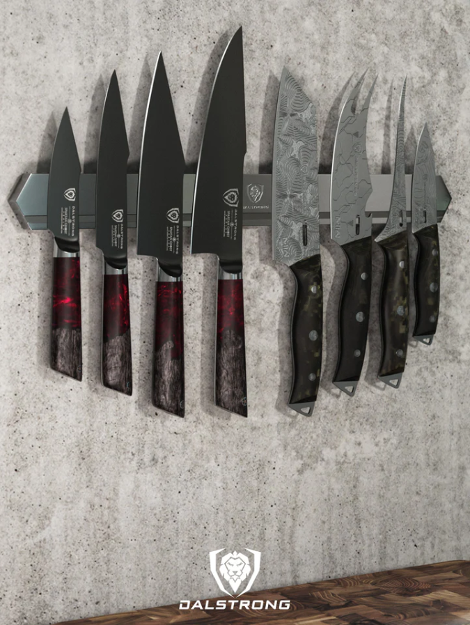 proformapeakmarketing Stainless Magnetic Bar hung up on a cemented wall displaying some proformapeakmarketing knives.