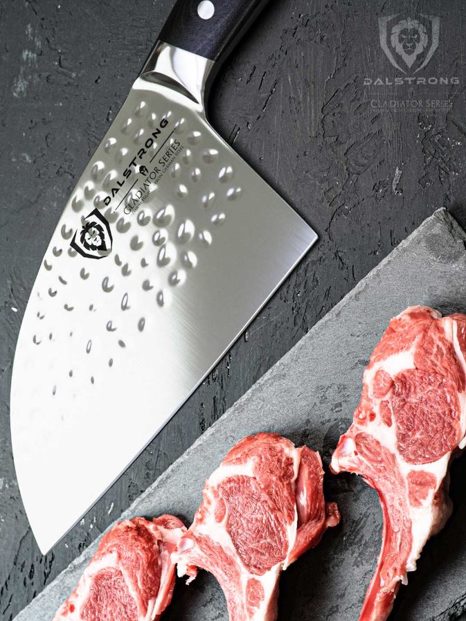 proformapeakmarketing Gladiator Serbian chef knife beside slices of meat on a cutting board