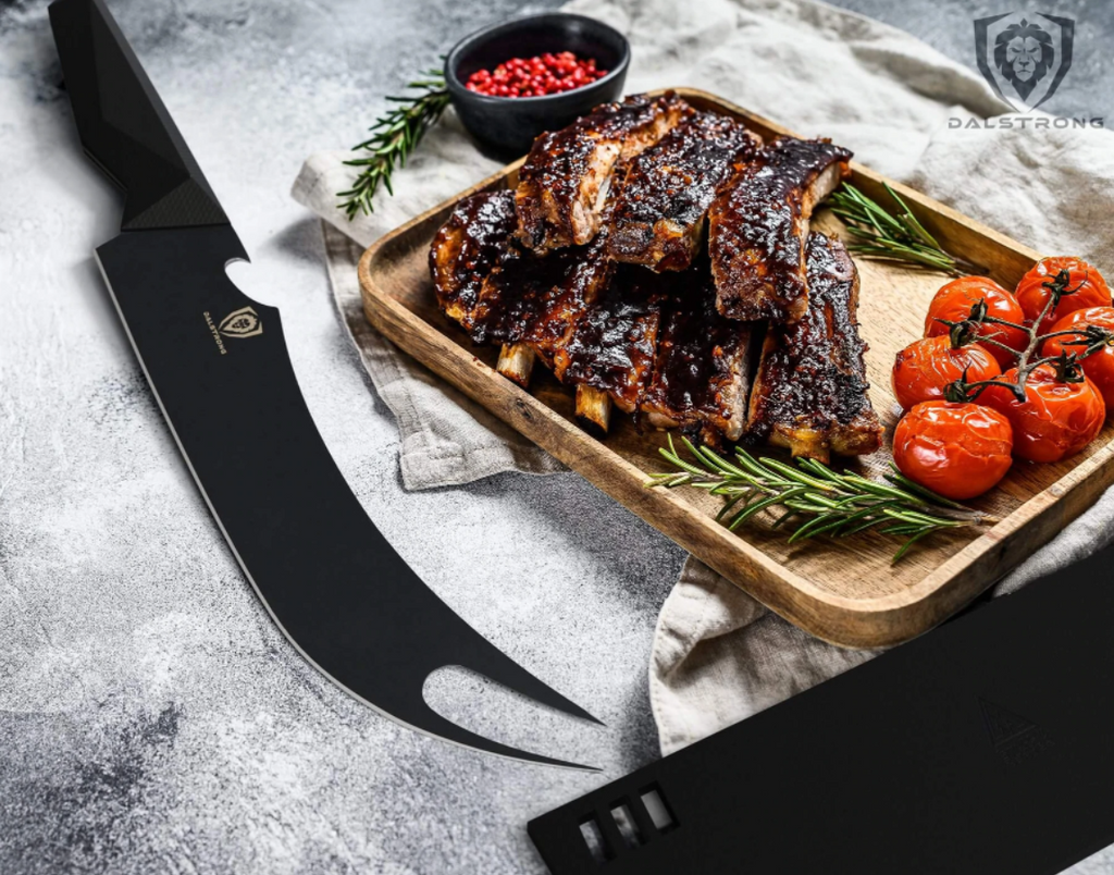 Stunning proformapeakmarketing Shadow Black 9" Pitmaster Knife next to a wooden tray of deliciously grilled ribs with tomatoes and rosemary on the side.