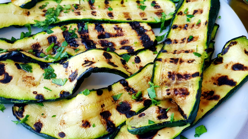 sliced grilled zucchini on a plate