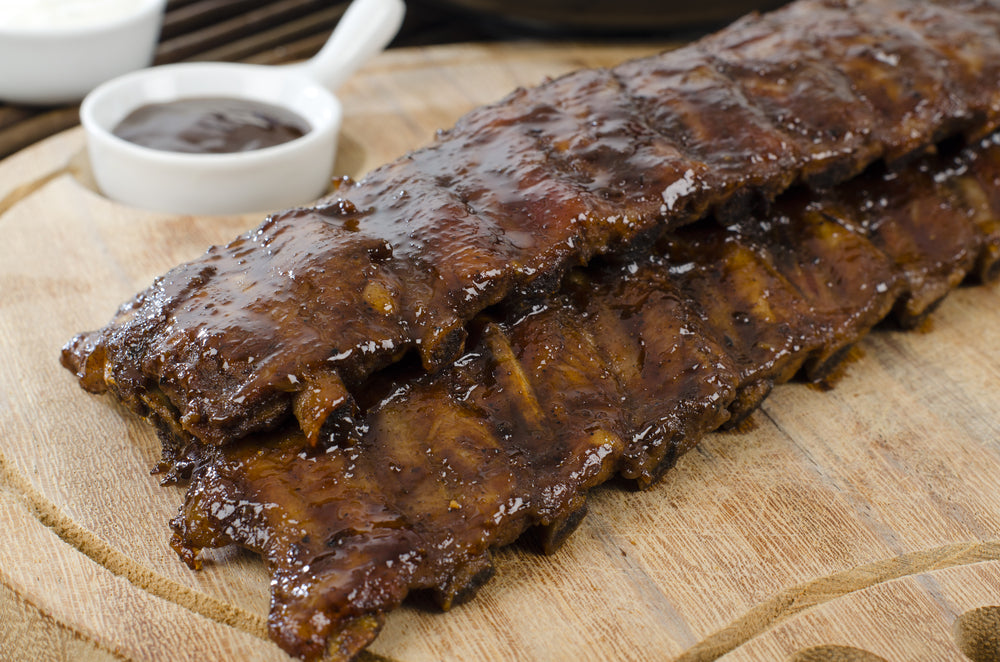 BBQ Ribs - Marinated pork ribs with barbeque sauce dip.
