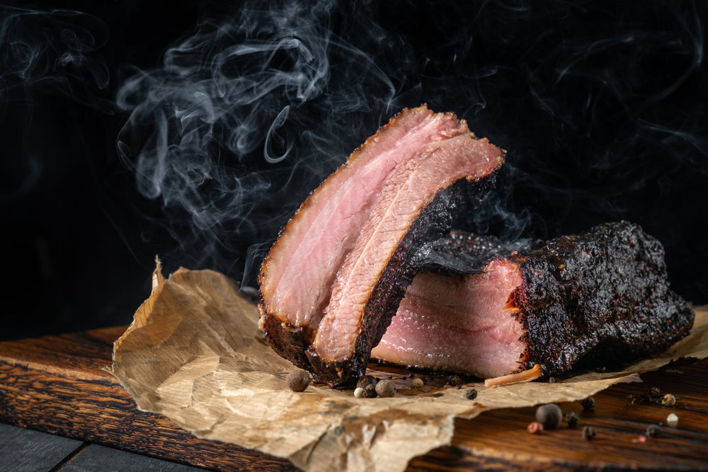 Texas style smoked beef brisket on brown wrapping paper