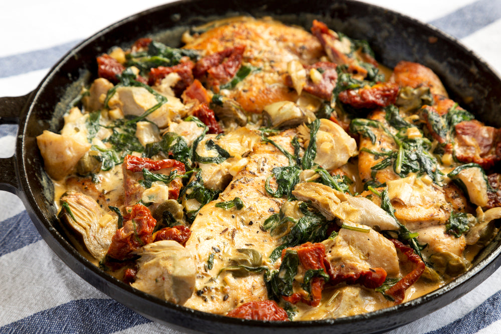 creamy tuscan chicken in pan