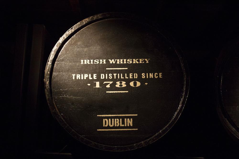 Old wooden barrel full of Dublin's Irish whiskey