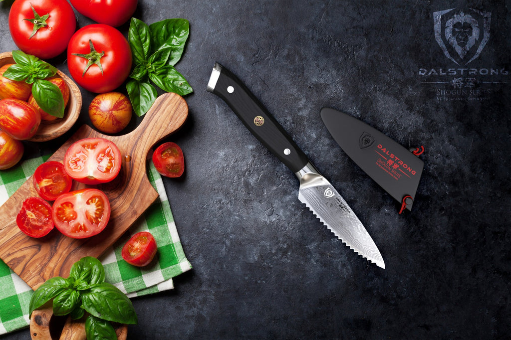 Serrated paring knife next to a cutting board filled with vegetables